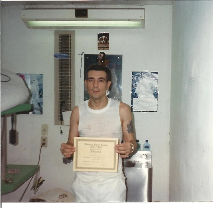 Me receiving my GED diploma.